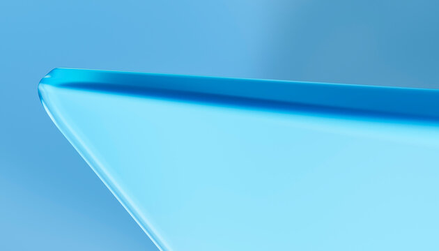 Close-up of blue glass corner with smooth rounded edges