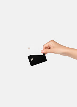 Hand Holding Blank Black and White Credit Cards