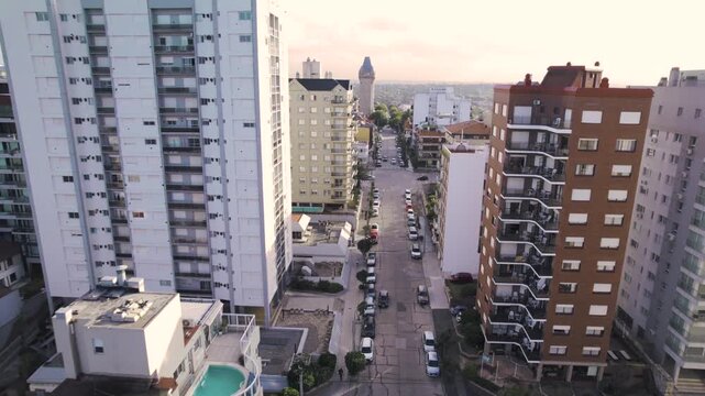 4K drone aerial view of downtown Mar del Plata, Argentina. Dense urban streets, buildings and distinctive city architecture create a dynamic view of one of Argentina&rsquo;s most popular coastal cities.