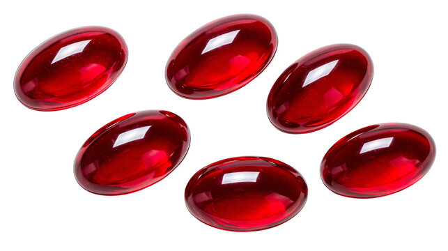 Shiny red oval gel capsules with glossy surface texture