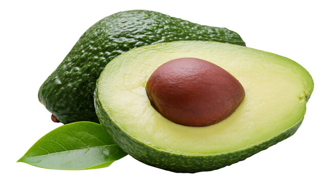 Whole and halved ripe avocado with green leaf and brown pit
