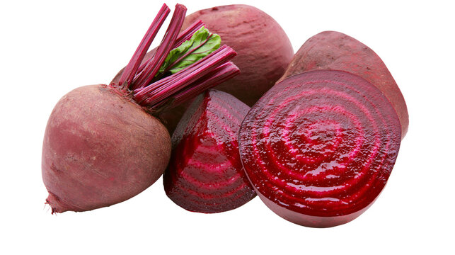 Fresh whole and sliced red beetroots with green stems