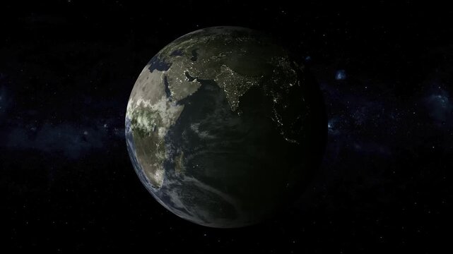 Planet Earth at night reveals glowing city lights from outer space. Starry cosmic background frames planet Earth at night. Beautiful orbital views capture planet Earth at night.