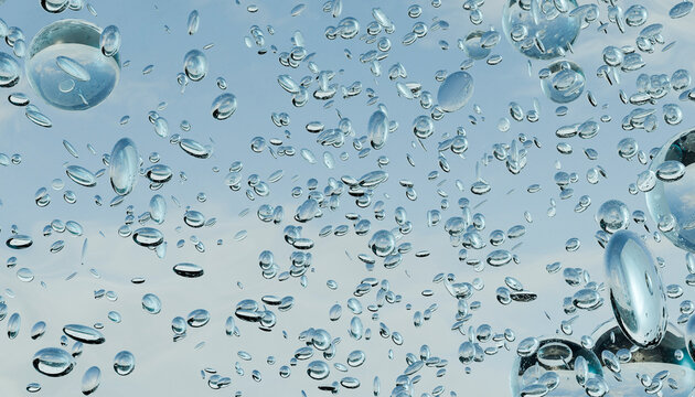 Transparent liquid bubbles float across a light blue background