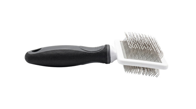 Professional pet grooming slicker brush with metal bristles and ergonomic black handle. Perfect for canine and feline hair care, isolated on black background for design.