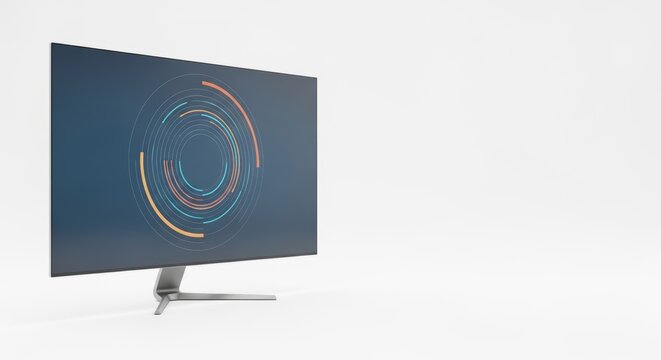 Modern computer monitor screen displaying abstract circular graphic design on desk with white background.