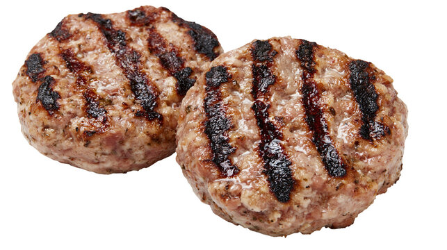 Two juicy grilled beef burger patties with dark char marks