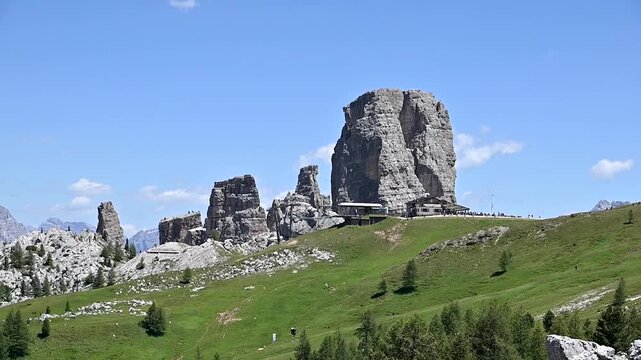 Iconic, dreamlike Dolomites. The Tofane and the Five Towers in summer. From hiking to climbing.