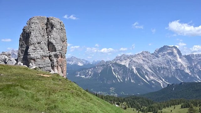 Iconic, dreamlike Dolomites. The Tofane and the Five Towers in summer. From hiking to climbing.