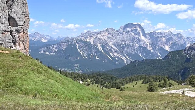 Iconic, dreamlike Dolomites. The Tofane and the Five Towers in summer. From hiking to climbing.