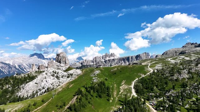 Iconic, dreamlike Dolomites. The Tofane and the Five Towers in summer. From hiking to climbing.