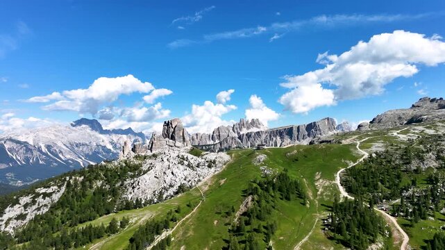 Iconic, dreamlike Dolomites. The Tofane and the Five Towers in summer. From hiking to climbing.