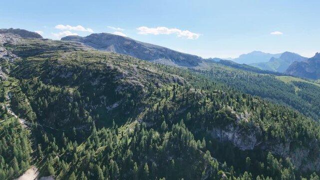 Iconic, dreamlike Dolomites. The Tofane and the Five Towers in summer. From hiking to climbing.