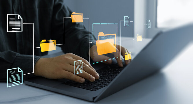 Process automation to efficiently manage files. Businesswoman working on laptop with virtual screen. Online documentation database and document management system concept.	
