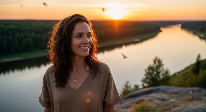 Woman enjoying sunset landscape