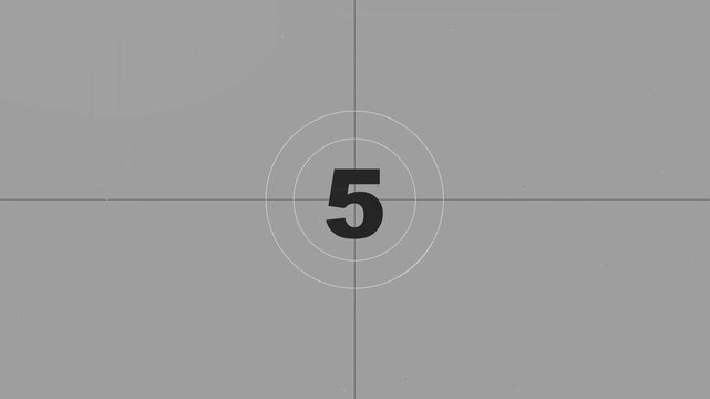 Film countdown leader with vintage dust and scratches on gray background