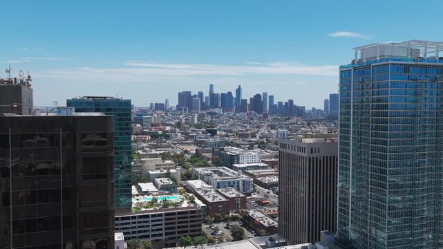 Aerial dolly shot revealing downtown Los Angeles from Koreatown in Southern California. 4K