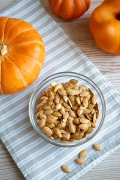 Roasted Pumpkin Seeds seasoned with spices in bowl