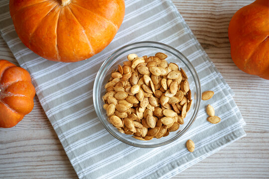 Roasted Pumpkin Seeds seasoned with spices in bowl