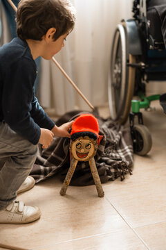 Child celebrating catalan christmas tradition tio de nadal