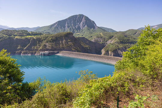 View of the dam wall of the reservoir lake of Serre-Poncon, producing water and electricity for the area