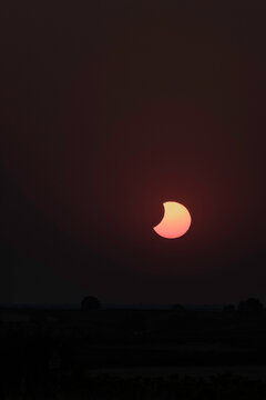 View of the partial solar eclipse, during partiality, in the countryside around San Juan del Monte, Burgos

