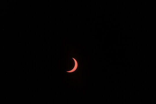View of the partial solar eclipse, during partiality, in the countryside around San Juan del Monte, Burgos
