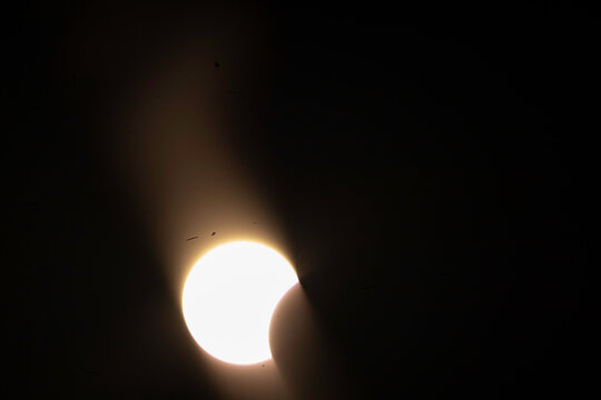 View of the partial solar eclipse, during partiality, in the countryside around San Juan del Monte, Burgos
