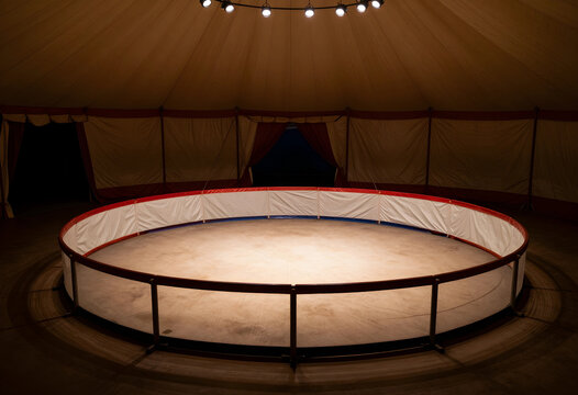Performance and entertainment industry, empty circus ring with spotlight in a big top tent for theatrical events and live show production