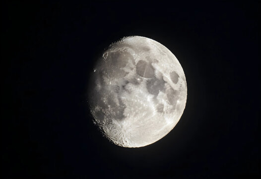 Astronomy and space exploration, full moon glowing in the dark night sky with detailed lunar craters and surface texture for science and nature themes