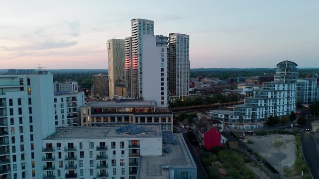 Sunset Aerial view modern skyscrapers dominating town skyline amid major residential and commercial regeneration project that ended in controversial Woking Council debts