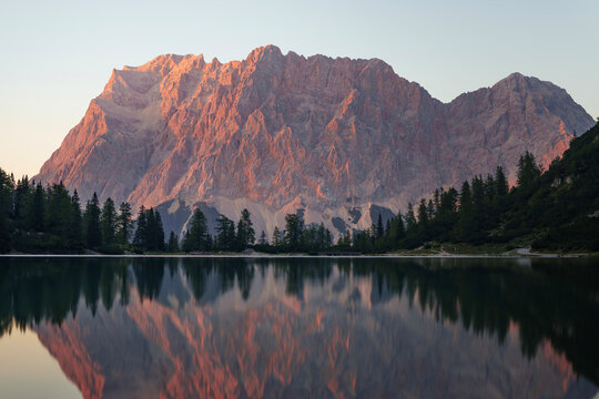 Seebensee Lake Reflecting Wetterstein Mountains in Evening Light at Sunset. Seebensee, Austria