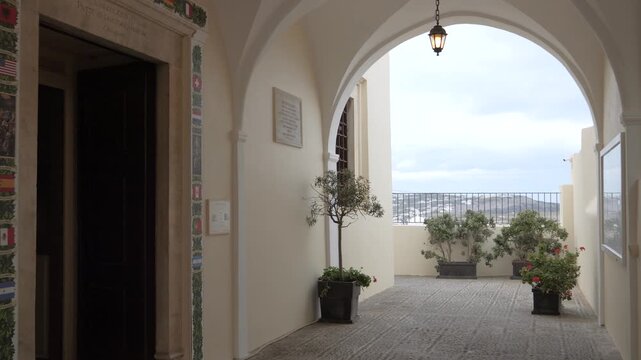 Arched entrance of Holy Cathedral of Saint John the Baptist in Fira Santorini