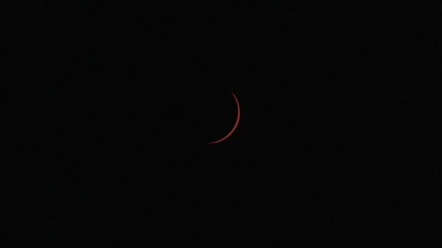 View of the partial solar eclipse, during partiality, in the countryside around San Juan del Monte, Burgos 