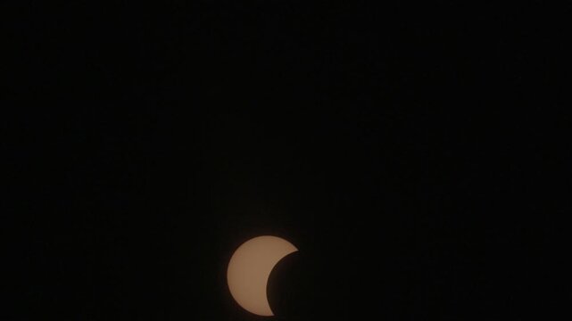 View of the partial solar eclipse, during partiality, in the countryside around San Juan del Monte, Burgos 