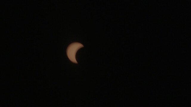 View of the partial solar eclipse, during partiality, in the countryside around San Juan del Monte, Burgos 