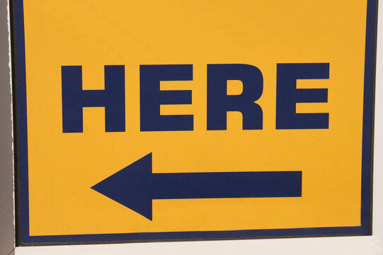 Sign here, arrow to the left or right