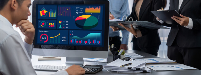 Business intelligence and data analysis concept. Analyst team working on financial data analysis...