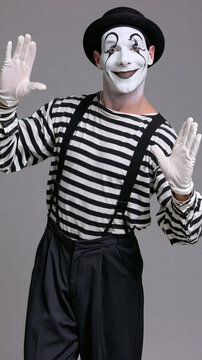 Smiling Male Mime Artist Performing in Classic Costume