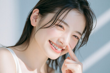 Fototapeta premium 爽やかで透明感のある美しい肌の笑顔の女性