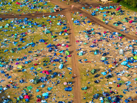 Reading, United Kingdom - 31 August 2026: Aerial view of Reading Festival campsite with numerous colorful tents scattered across the grassy field and dirt paths.
