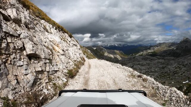 POV of an off-road vehicle driving on a bumpy mountain trail in the south of Montenegro