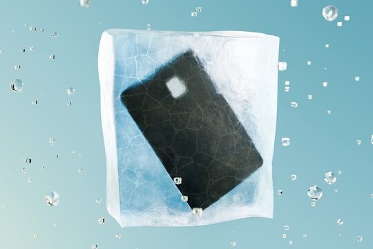 Bank card inside the ice cube, symbolizing blocked account access, financial restrictions, account freeze,  banking security, fraud prevention, and protection against unauthorized transactions.