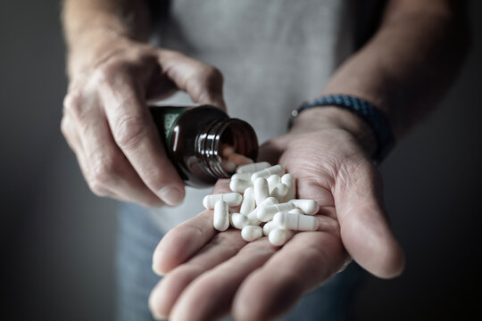 Taking prescription medicine pills or capsules