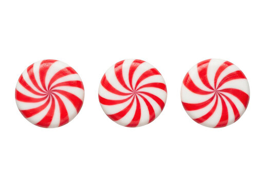 Three peppermint swirl candies isolated on transparent background
