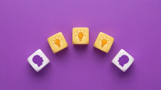 Conceptual image of two people represented by head icons on dice, with three lightbulb icons between them, brainstorming, ideas, and collaborative thinking world kindness day