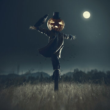 Creepy Halloween scarecrow in the fields at night