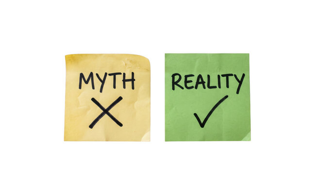 Concept of myth versus reality with checkmark and cross symbols on sticky notes