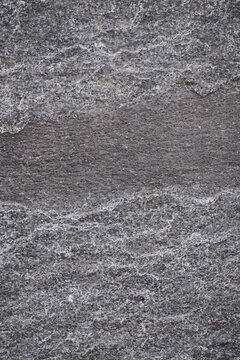 Abstract gray stone background texture. Vertical image.