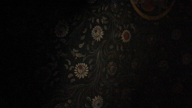 Painted lotus and floral motifs on the ceiling of the Luri Gompa cave monastery, Yara, Upper Mustang, Nepal